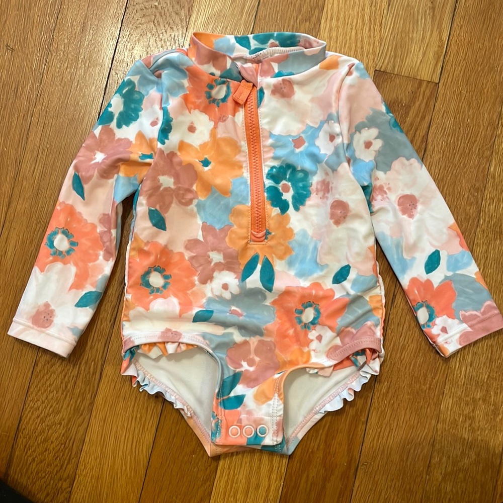 Never worn one piece rash guard zip toddler swimsuit!